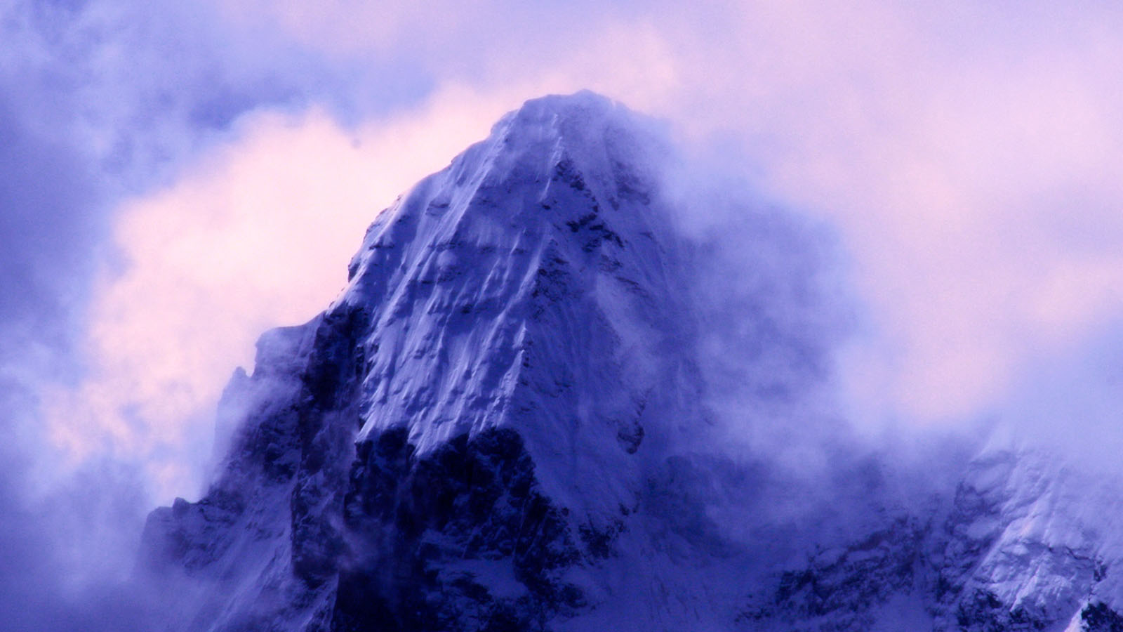 Mountain landscape desktop wallpaper in fog