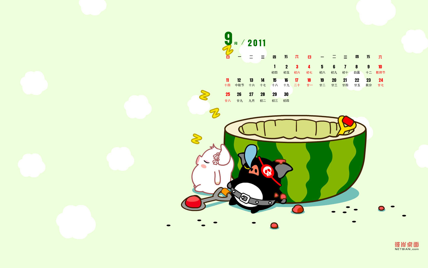 Black and white pigs eat watermelon September 2011 calendar desktop background