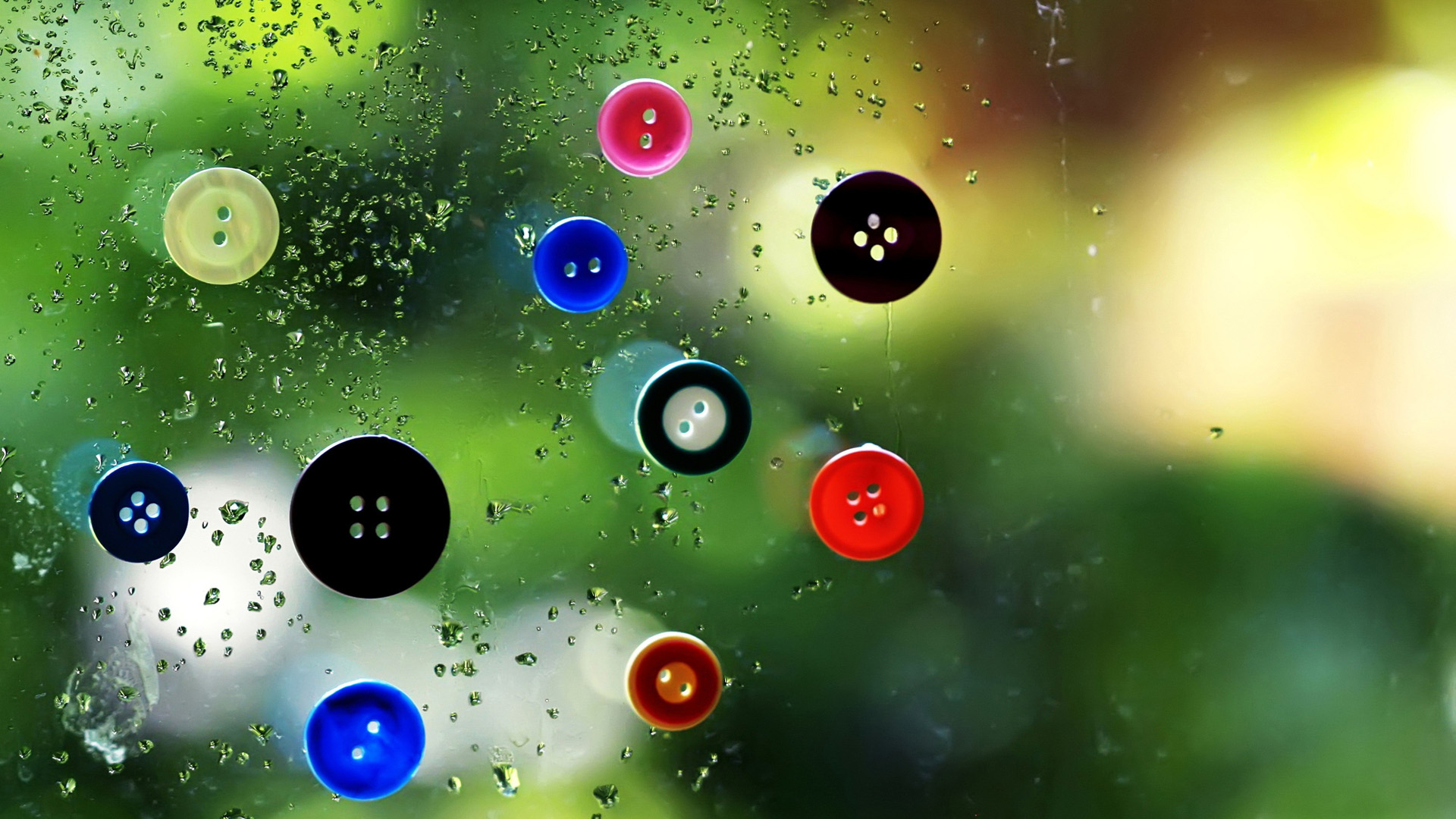 Button and glass raindrop wallpaper